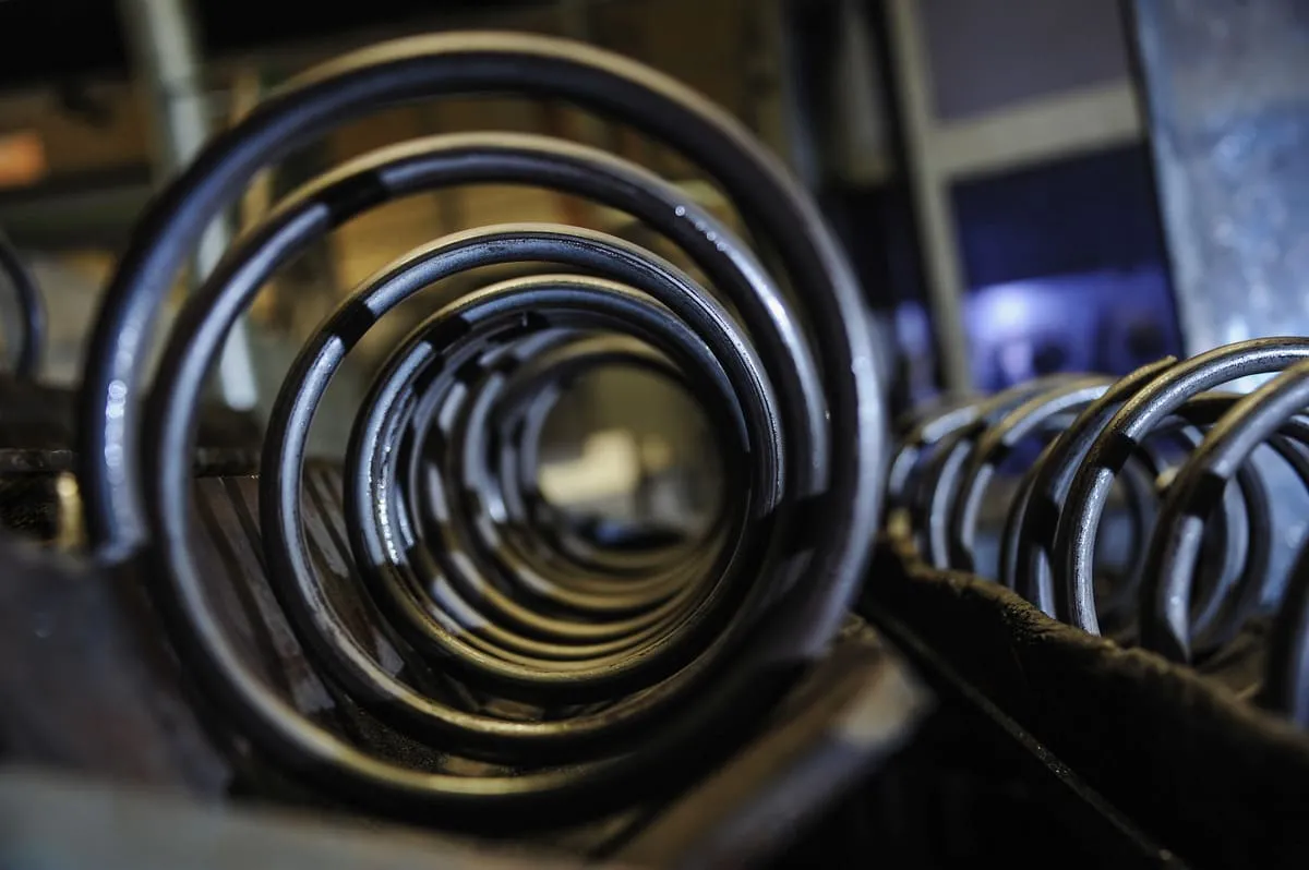 A close-up image of a suspension spring, illustrating Lesjöfors’ work to develop custom springs for this market segment.